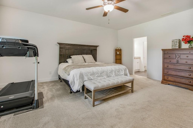 594 Maner Rd, Rockmart, GA 30153 - bedroom with light colored carpet, baseboards, ceiling fan, and ensuite bath