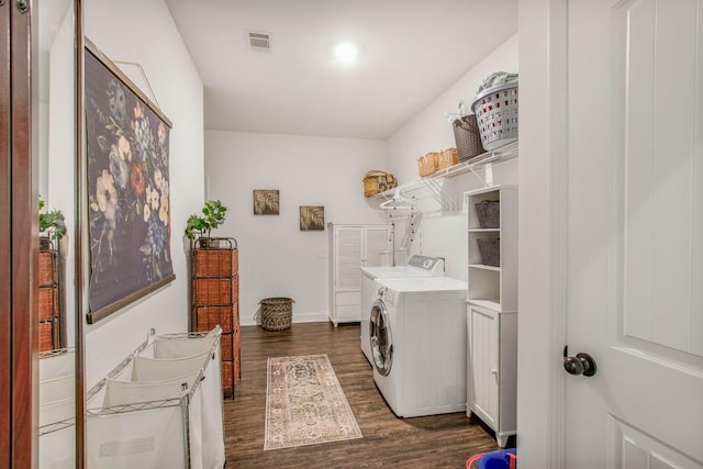 594 Maner Rd, Rockmart, GA 30153 - laundry area with washing machine and clothes dryer, dark wood-type flooring, and baseboards