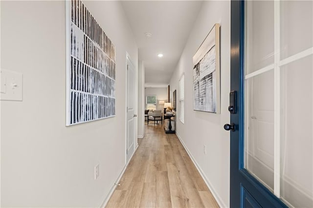 hall with mail area, recessed lighting, light wood-style flooring, and baseboards