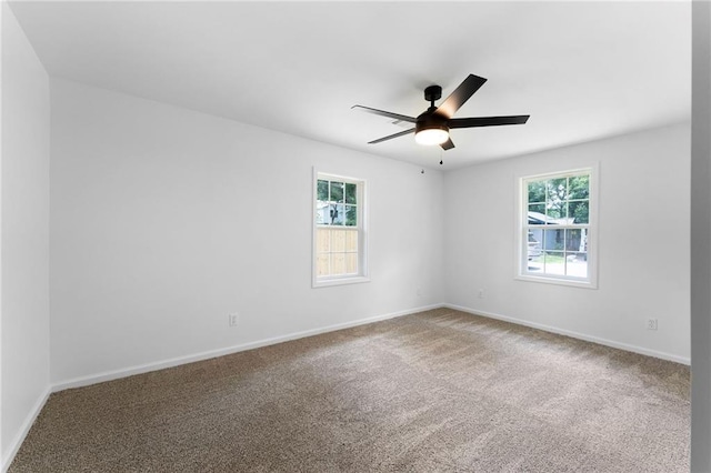 44 Crayton St, Rockmart, GA 30153 - carpeted spare room with a ceiling fan and baseboards
