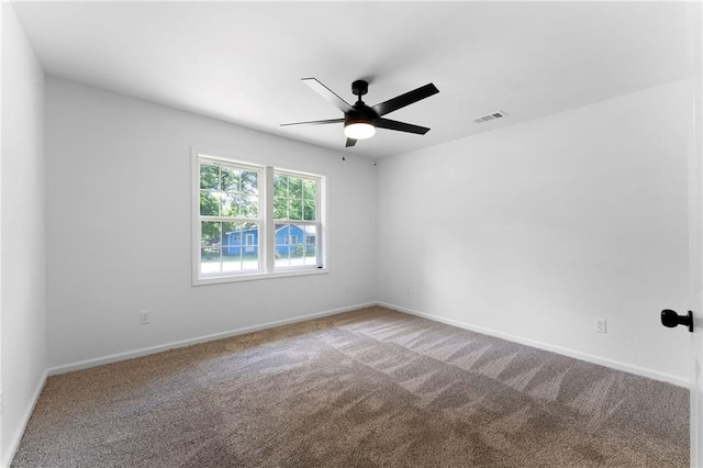 44 Crayton St, Rockmart, GA 30153 - spare room with ceiling fan, carpet floors, and baseboards