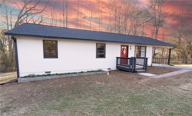 view of front of house featuring covered porch, roof with shingles, and crawl space