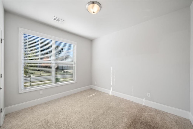 view of carpeted spare room