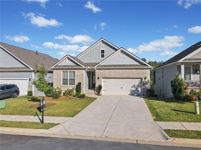 craftsman-style home featuring a front lawn and a garage