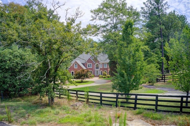 exterior space featuring a fenced front yard