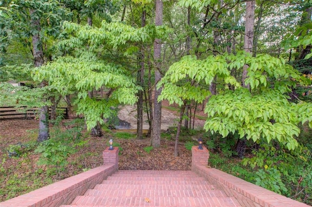 view of patio / terrace featuring fence