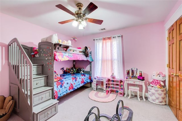 bedroom featuring carpet flooring, visible vents, and ceiling fan