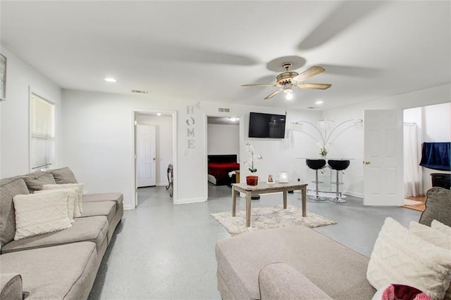 living room featuring a ceiling fan, recessed lighting, baseboards, and visible vents