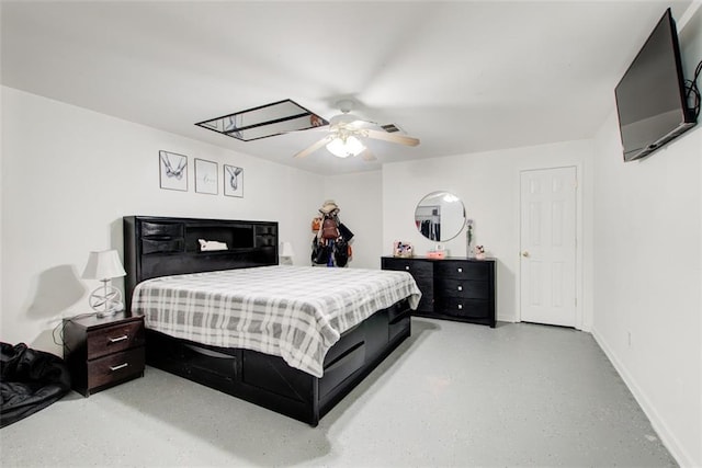 bedroom featuring a ceiling fan, visible vents, and baseboards