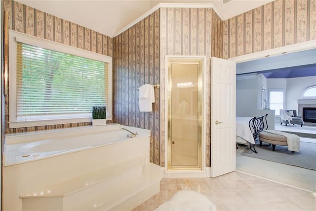 full bath with wallpapered walls, ensuite bath, and a shower stall