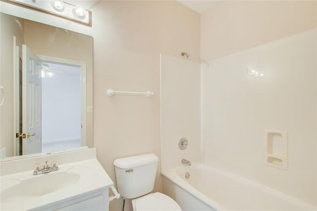 full bathroom with vanity, toilet, and shower / tub combination