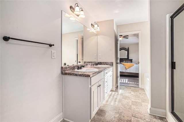 bathroom featuring ceiling fan and vanity