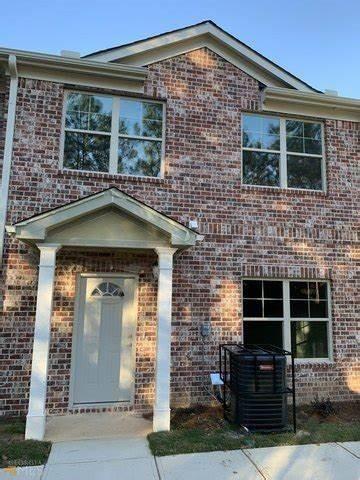 3413 Mount Zion Rd, Stockbridge, GA 30281 - traditional-style home with brick siding