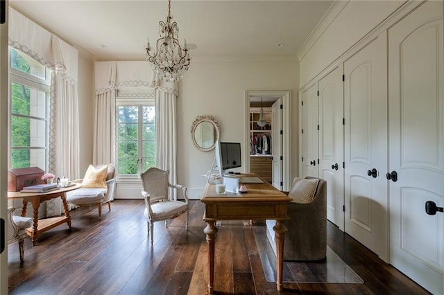 office area with dark wood-type flooring, a chandelier, and ornamental molding