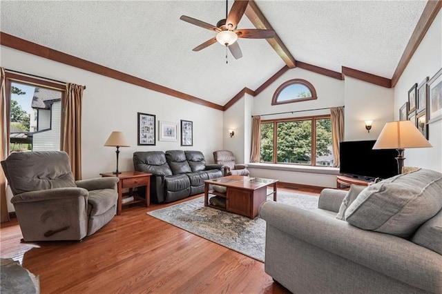 2011 Sturbridge Ln, Buford, GA 30519 - living room with a ceiling fan, wood finished floors, and a textured ceiling