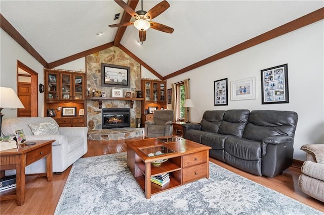 2011 Sturbridge Ln, Buford, GA 30519 - living area featuring a ceiling fan, a fireplace, and light wood-style floors
