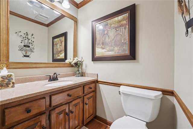 2011 Sturbridge Ln, Buford, GA 30519 - bathroom featuring toilet, vanity, and crown molding