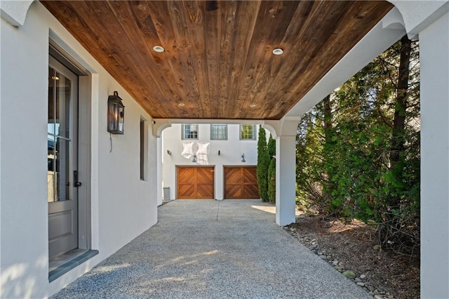 view of patio featuring a garage