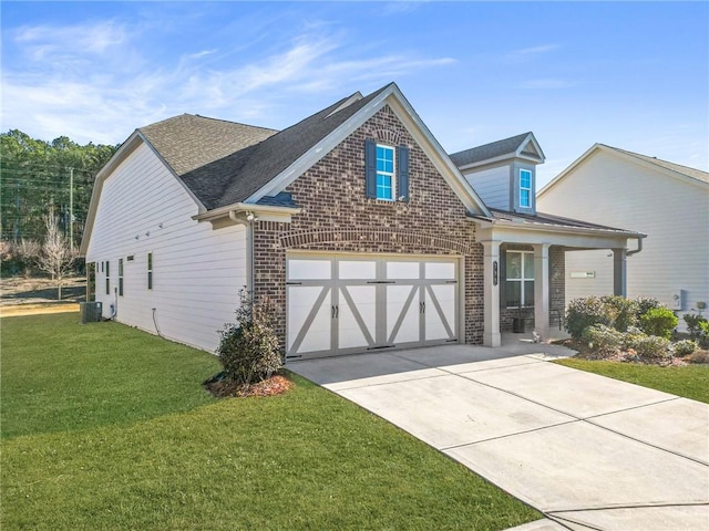 view of front of property featuring central AC, a porch, a front yard, and a garage