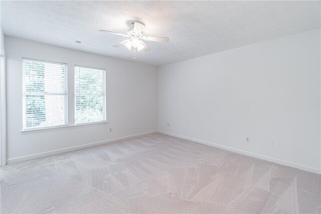 4307 Windward Ln, Norcross, GA 30093 - unfurnished room with ceiling fan, light colored carpet, and a textured ceiling