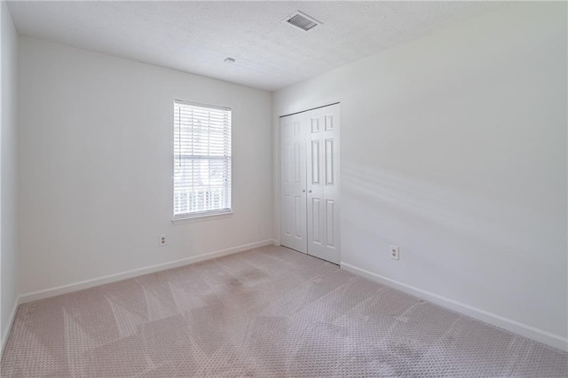 4307 Windward Ln, Norcross, GA 30093 - spare room with light carpet and a textured ceiling