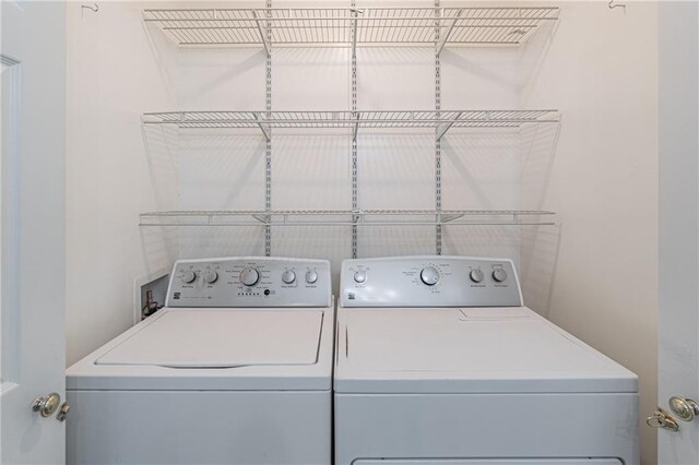 4307 Windward Ln, Norcross, GA 30093 - laundry area with washing machine and clothes dryer