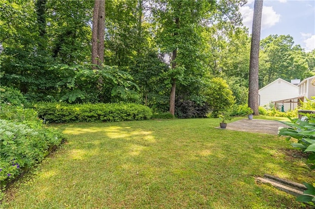 4307 Windward Ln, Norcross, GA 30093 - view of green lawn featuring a patio area
