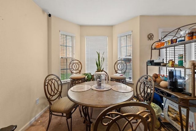 1955 Shawn Wayne Cir SE, Atlanta, GA 30316 - dining space with baseboards and carpet floors