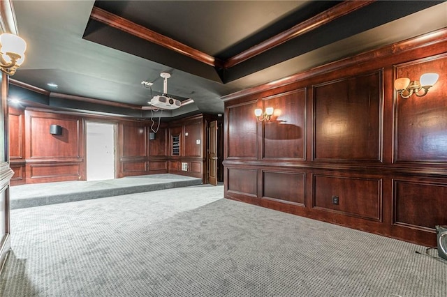 interior space with crown molding and a tray ceiling