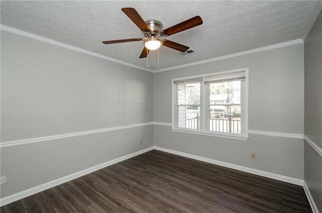 empty room featuring ceiling fan, ornamental molding, a textured ceiling, and dark hardwood / wood-style floors