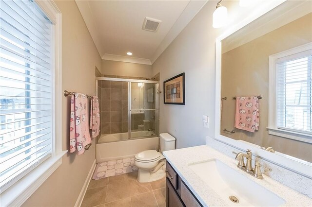 6626 Sterling Dr, Sandy Springs, GA 30328 - bathroom with toilet, tile patterned floors, vanity, bath / shower combo with glass door, and baseboards