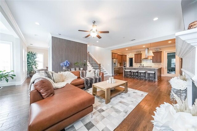 6626 Sterling Dr, Sandy Springs, GA 30328 - living area featuring stairs, hardwood / wood-style floors, ceiling fan, crown molding, and recessed lighting