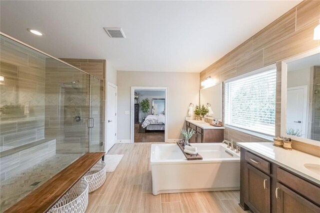 6626 Sterling Dr, Sandy Springs, GA 30328 - full bathroom featuring a shower stall, a bathtub, ensuite bath, vanity, and recessed lighting