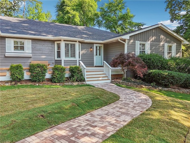 2655 Nesbit Trl, Alpharetta, GA 30022 - single story home with a front lawn and board and batten siding