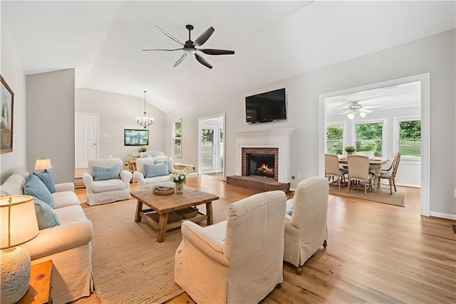 2655 Nesbit Trl, Alpharetta, GA 30022 - living area featuring ceiling fan, healthy amount of natural light, a fireplace, and lofted ceiling