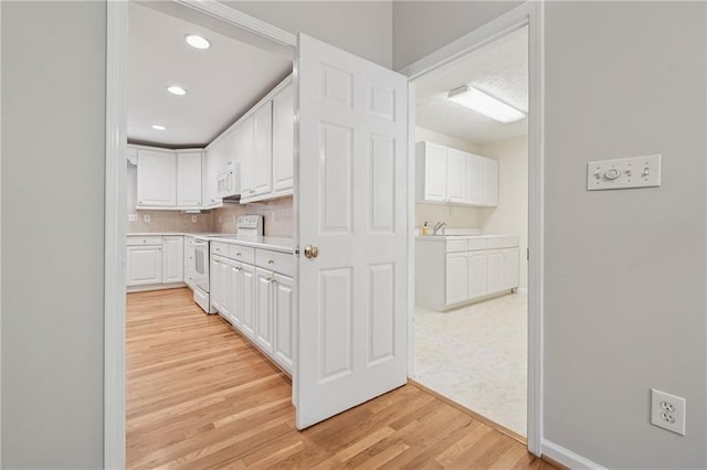 2655 Nesbit Trl, Alpharetta, GA 30022 - hall featuring light wood-style flooring and recessed lighting