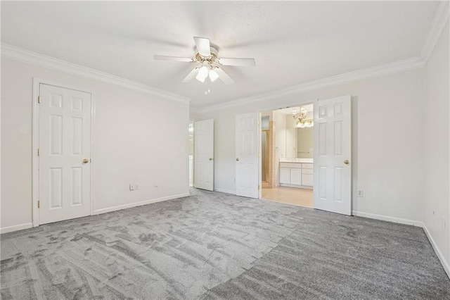 2655 Nesbit Trl, Alpharetta, GA 30022 - unfurnished bedroom with a chandelier, crown molding, carpet, ensuite bath, and a ceiling fan