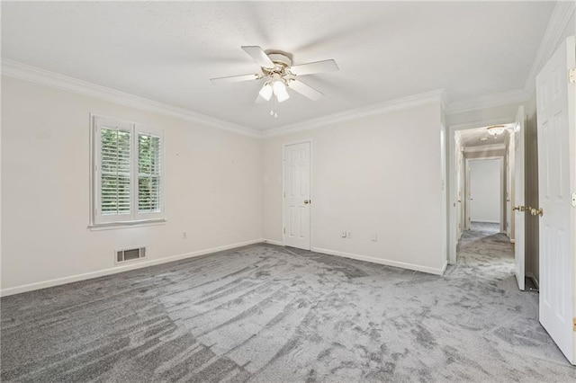 2655 Nesbit Trl, Alpharetta, GA 30022 - spare room featuring carpet flooring, crown molding, and a ceiling fan