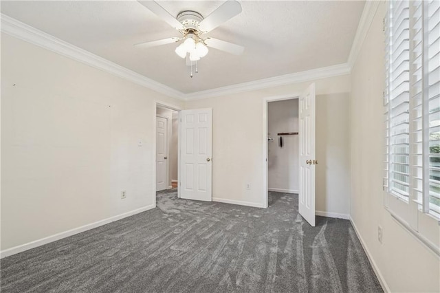 2655 Nesbit Trl, Alpharetta, GA 30022 - unfurnished bedroom featuring dark colored carpet, crown molding, and ceiling fan