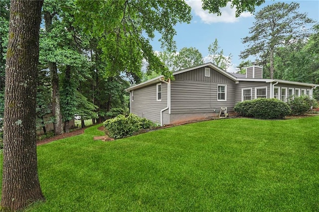 2655 Nesbit Trl, Alpharetta, GA 30022 - view of side of property with a chimney and a lawn