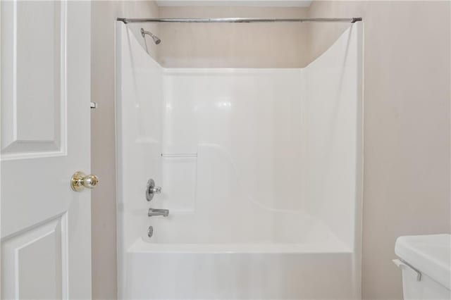 full bath featuring toilet and shower / bathtub combination