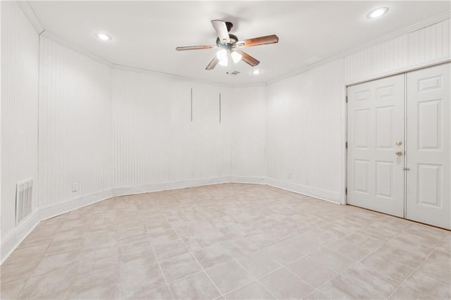 spare room featuring ornamental molding, recessed lighting, visible vents, and ceiling fan