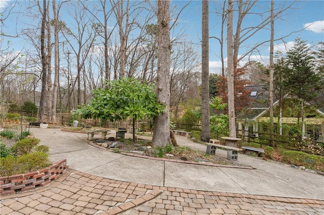 surrounding community featuring fence