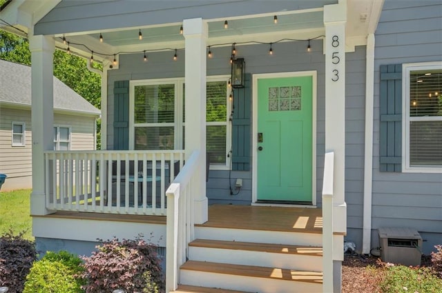 property entrance featuring covered porch