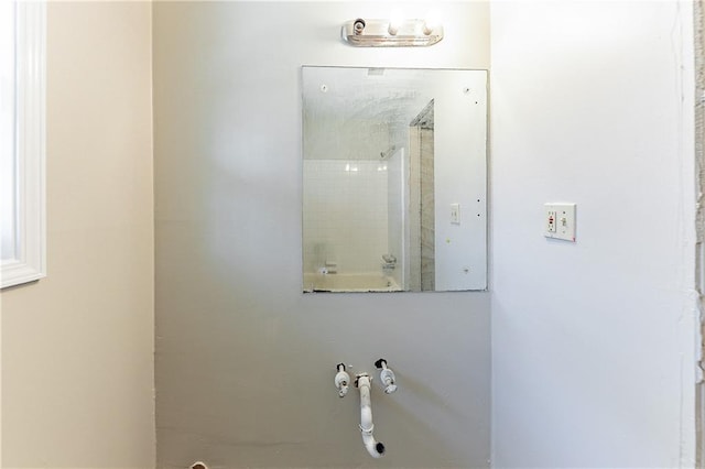 bathroom featuring walk in shower