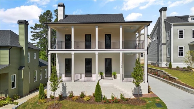 view of front of house with a balcony