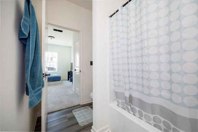 155 Knightsbridge Ln, Winder, GA 30680 - full bathroom featuring toilet, wood finished floors, and baseboards