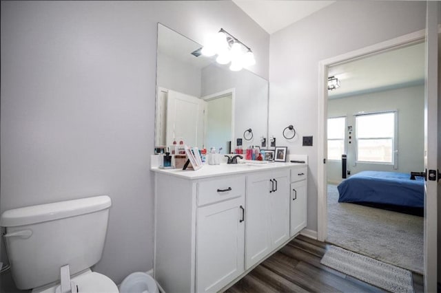 155 Knightsbridge Ln, Winder, GA 30680 - ensuite bathroom featuring wood finished floors, toilet, and vanity