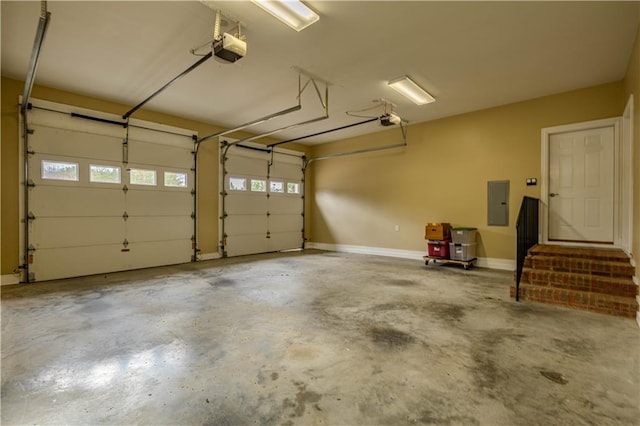 garage with electric panel and a garage door opener