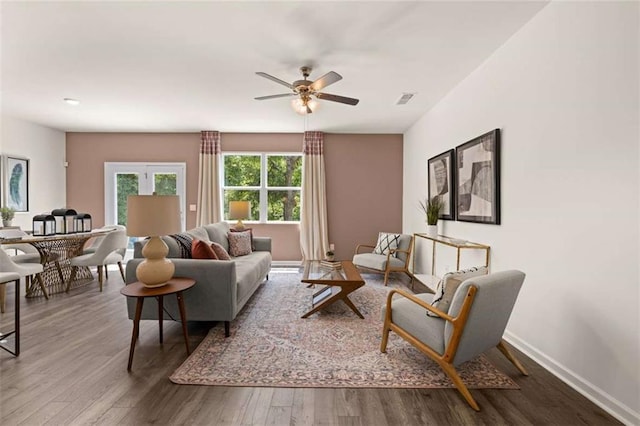 1315 Aura Ln, Lawrenceville, GA 30045 - living room featuring wood finished floors and ceiling fan